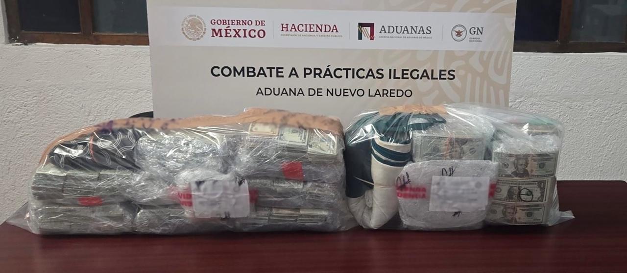 Autoridades aseguraron 769 mil 755 dólares durante una revisión con rayos X en la Aduana de Nuevo Laredo; el dinero quedó a disposición del Ministerio Público.